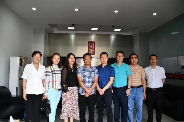 重庆市秀山自治县到广东荣业食品有限公司考察交流